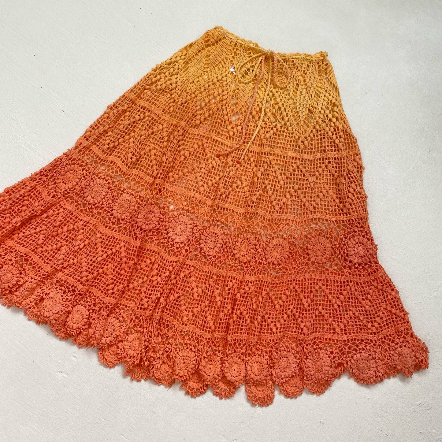 Secondhand Alix Pinho Revolve Sunset Crochet Midi Skirt in Orange, Size Small