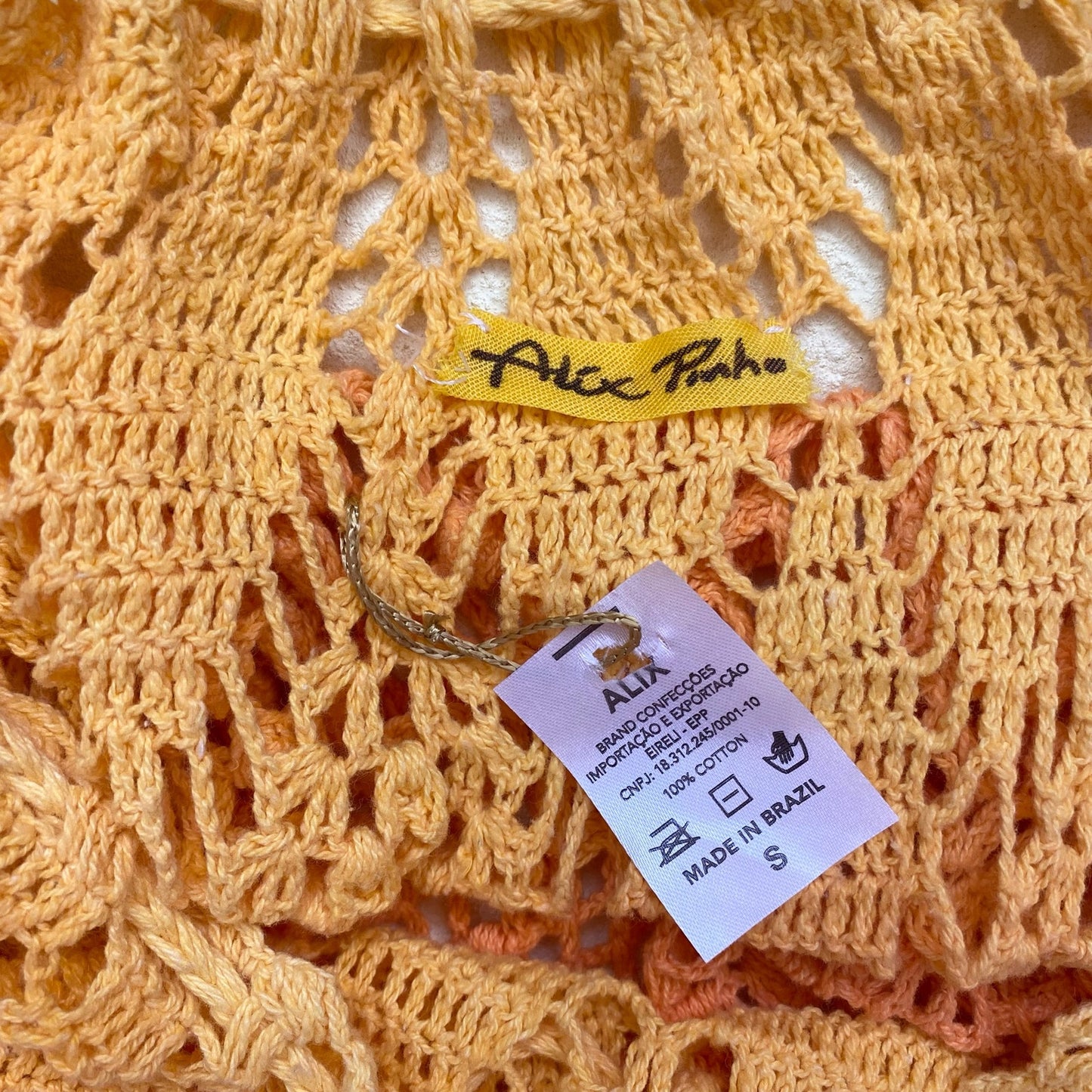 Secondhand Alix Pinho Revolve Sunset Crochet Midi Skirt in Orange, Size Small
